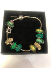 Load image into Gallery viewer, Pandora silver braclet with charms
