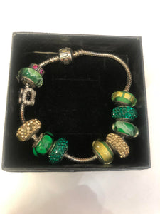 Pandora silver braclet with charms