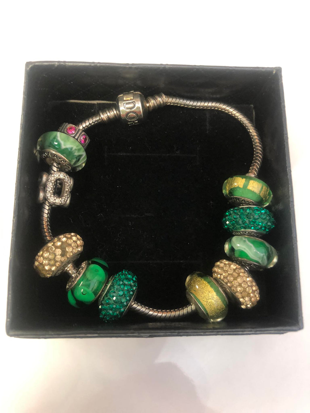 Pandora silver braclet with charms